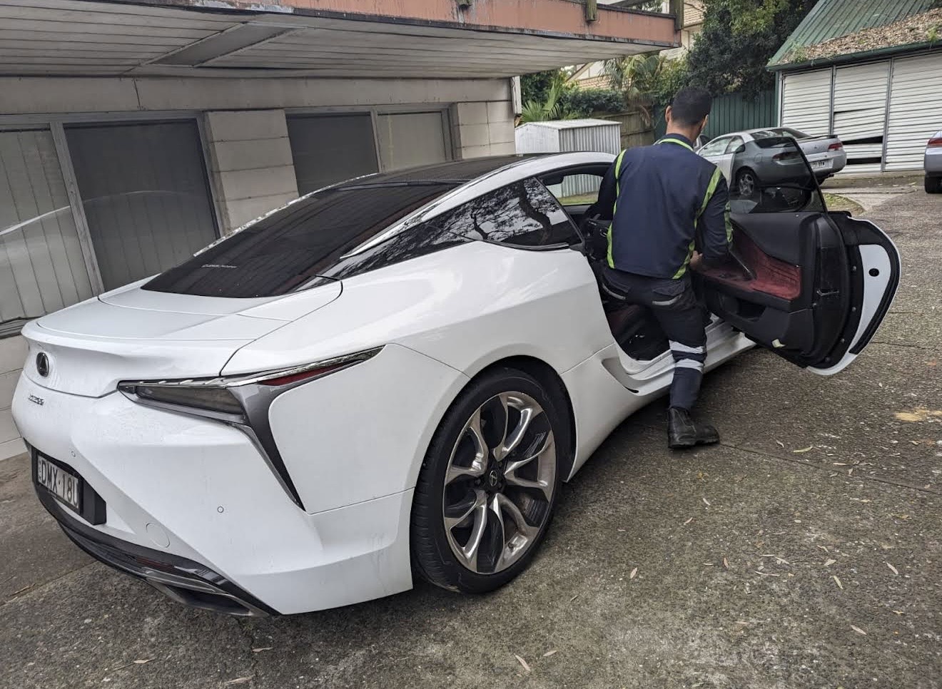 White Lexus LC coupe after a mobile mechanic service call in Castle Hill