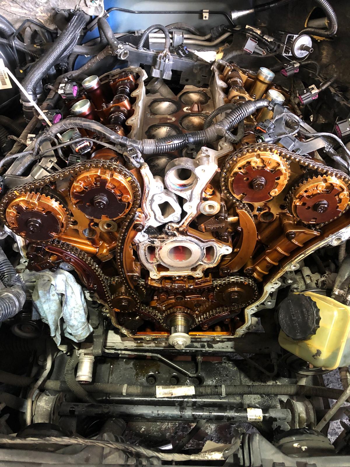 V6 engine with timing chains and cam gears exposed during a timing service by a mobile mechanic in Western Sydney